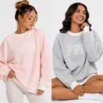 Pale pink and heather grey lace-embroidered oversized crewneck sweatshirts